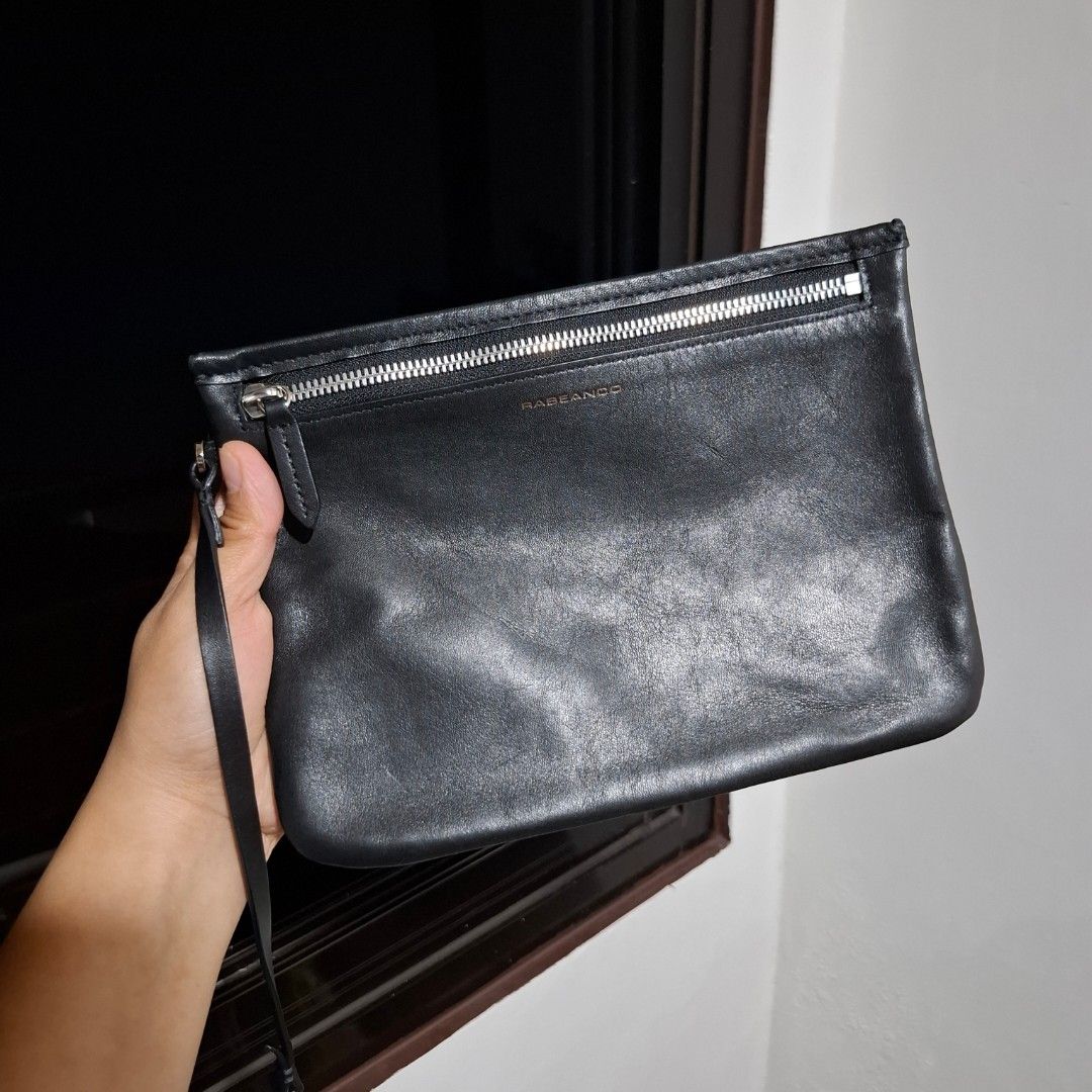 Rabeanco Wristlet Pouch (Free SF) (Category: Purses & Pouches) located in Baguio. Submitted by bycharmaebuys (Listing ID 1470451988, Image 1). Description: Brand: Rabeanco Guaranteed Authentic 💯 PRICE: 550.00 LP. Gcash now: 450.00 ‼️FREE SHIPPING NATIONWIDE‼️ First to pay basis Large Size, Slim Type, wristlet Pouch Dimension: 22.5 m x 17cm Genuine Leather Material Black color w/ silver hardware Kasya Small-Medium Size wallet Kasya din Cellphone 