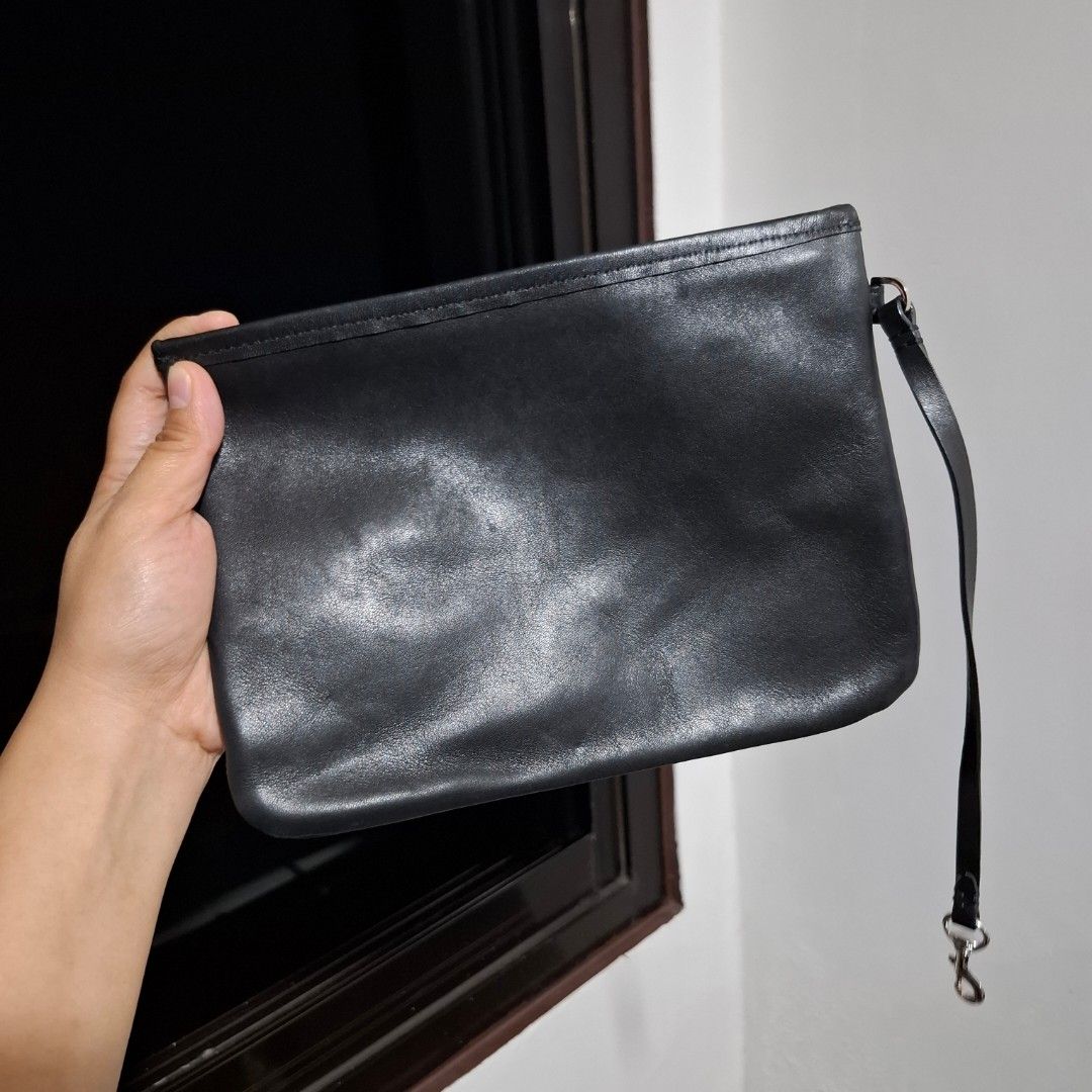 Rabeanco Wristlet Pouch (Free SF) (Category: Purses & Pouches) located in Baguio. Submitted by bycharmaebuys (Listing ID 1470451988, Image 2). Description: Brand: Rabeanco Guaranteed Authentic 💯 PRICE: 550.00 LP. Gcash now: 450.00 ‼️FREE SHIPPING NATIONWIDE‼️ First to pay basis Large Size, Slim Type, wristlet Pouch Dimension: 22.5 m x 17cm Genuine Leather Material Black color w/ silver hardware Kasya Small-Medium Size wallet Kasya din Cellphone 