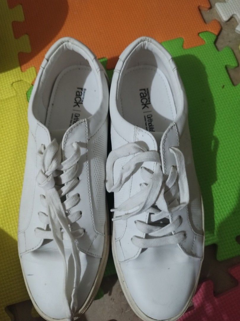 Rack White Sneakers Size 9.5M (Category: Sneakers) located in Binan City. Submitted by onigthegreat (Listing ID 1470479123, Image 1). Description: - Brand: Rack - Size: 9.5M - Color: Clean white (goes with any outfit) - Closure: Lace-up with breathable perforated side panels - Comfort: Ortholite insoles - Material: Manmade upper with leather and manmade sole - Condition: Normal wear on soles.
