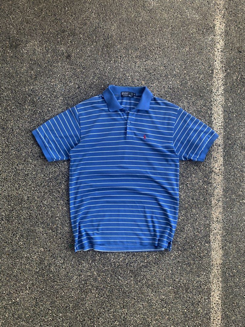 Ralph Lauren Polo (Category: Tshirts & Polo Shirts ) located in Dagupan City. Submitted by upcycle69 (Listing ID 1470446271, Image 1). Description: POLO BY RALPH LAUREN – BLUE STRIPED POLO SHIRT 📌 Details: * Brand: Polo by Ralph Lauren * Size: XL * Color: Blue with White Stripes * Design: Short Sleeve Polo Shirt * Logo: Red Pony Embroidery * Measurements: 22 x 30 inches * Condition: Good Condition * Issues: No issue * Buttons and collar are pres