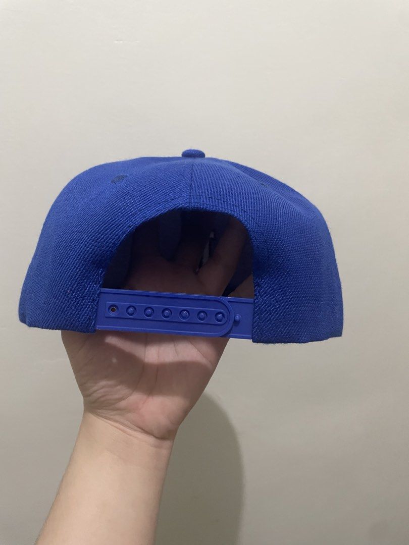 Real Fire Los Angeles Dodgers Blue Snapback Hat (Category: Babies & Kids Fashion) located in Guiguinto. Submitted by beatan13 (Listing ID 1470506006, Image 2). Description: - Color: Fire Blue - Design: White embroidered LA logo - Closure: Adjustable plastic snapback - Details: Branded interior taped seams, clean overall shape with a flat brim.