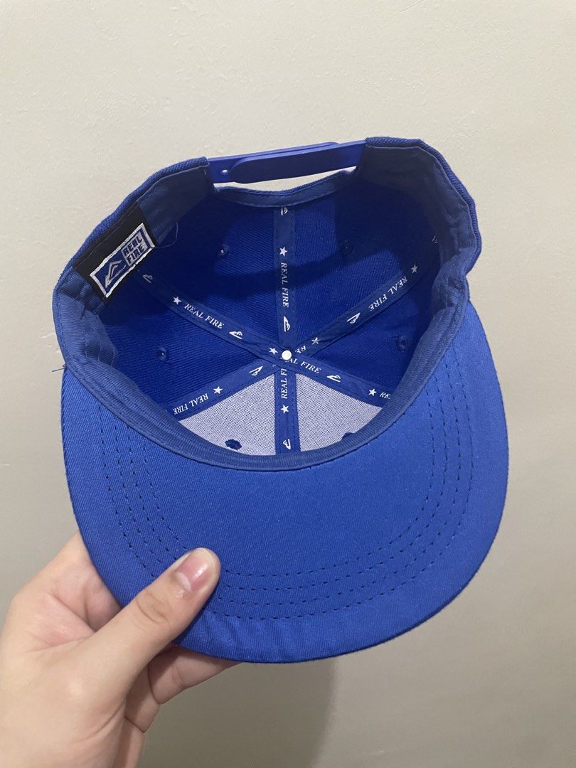 Real Fire Los Angeles Dodgers Blue Snapback Hat (Category: Babies & Kids Fashion) located in Guiguinto. Submitted by beatan13 (Listing ID 1470506006, Image 3). Description: - Color: Fire Blue - Design: White embroidered LA logo - Closure: Adjustable plastic snapback - Details: Branded interior taped seams, clean overall shape with a flat brim.