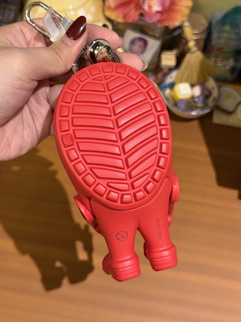 Red Crocs Lil Classic Bag Charm (Croslite Guy character charm) (Category: Character Goods) located in Malolos. Submitted by bg.brnrdo (Listing ID 1470464749, Image 2). Description: - Crocs Lil Classic Bag Charm (also known as the Croslite Guy character charm) in a red colorway - Got this at their physical store in SM North EDSA Annex - Brand new and never used RFS: Decluttering 📍Location: Malolos City, Bulacan 💳 MOP: Gcash/Maribank/Maya 📦 MOD: