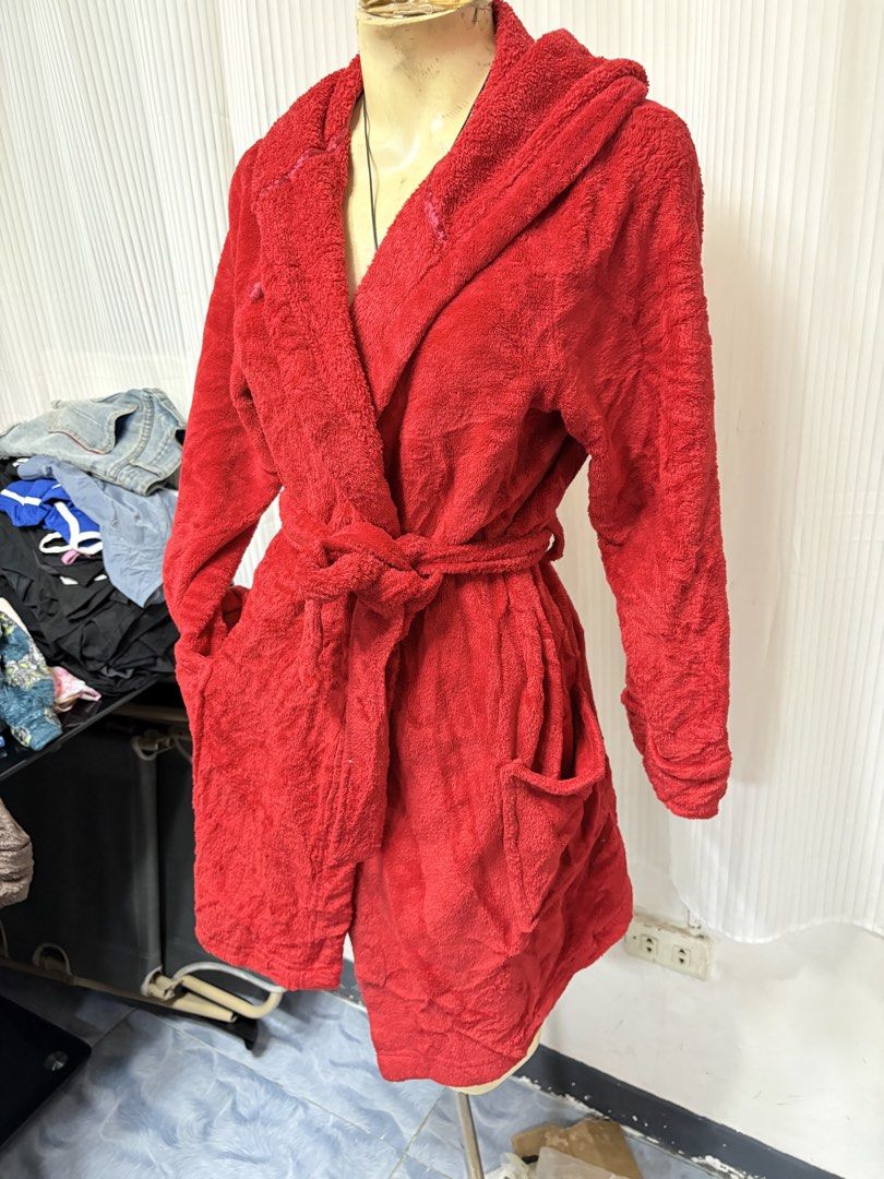 Red Plush Hooded Bathrobe with Belt and Pockets (Category: Coats, Jackets and Outerwear) located in General Trias. Submitted by crissy9053136 (Listing ID 1470486841, Image 2). Description: Bright red plush bathrobe. Fluffy fleece material, super cozy and warm. Includes a matching tie belt and two front pockets. Attached hood on the back. Knee-length fit. Great lounge piece for chilly mornings or after a shower..
