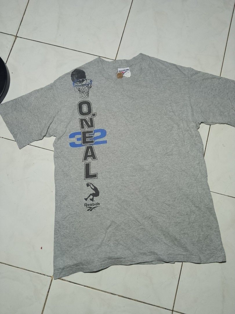 Reebok "Shaq O'neal" Tshirt (Category: Tshirts & Polo Shirts ) located in Mabalacat. Submitted by zero2mthrift (Listing ID 1470423844, Image 1). Description: Excellent condition No issue Complete tags and details 21x28 Reebok Vintage Tag. 1-1-2 Stitching Location: Pampanga.