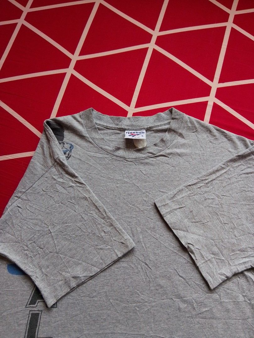Reebok "Shaq O'neal" Tshirt (Category: Tshirts & Polo Shirts ) located in Mabalacat. Submitted by zero2mthrift (Listing ID 1470423844, Image 3). Description: Excellent condition No issue Complete tags and details 21x28 Reebok Vintage Tag. 1-1-2 Stitching Location: Pampanga.