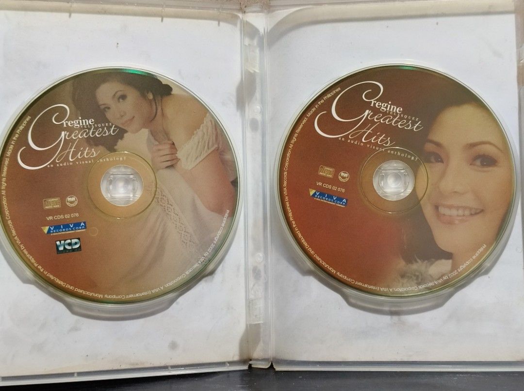 Regine Velasquez Greatest Hits Audio Visual Anthology CD VCD (Category: CDs & DVDs) located in Manila. Submitted by ruelcabrer77078 (Listing ID 1470356930, Image 2). Description: - Artist: Regine Velasquez - Album: Greatest Hits Audio-Visual Anthology - Label/Release Year: Viva Records Corporation, 2002 - Format: 1 CD (15 hits) + 1 VCD (15 trendsetting videos) - Notable Tracks: Sa Akin Pag-iisa, Ikaw, Fallin, Pangako, and more - Condition: Origin