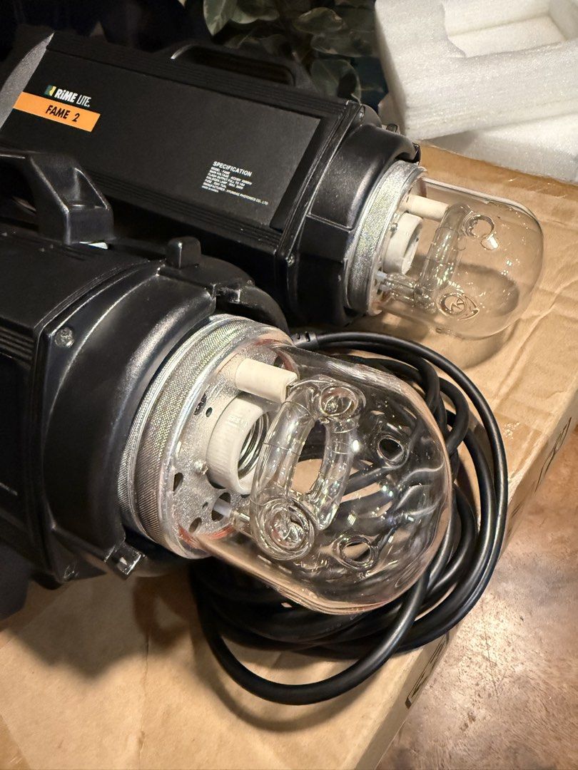 Rime Lite Fame 2 Studio Strobe Flash Lights (Category: Lighting & Studio Equipment) located in Quezon City. Submitted by jaxandzac (Listing ID 1470520402, Image 3). Description: - Set of 2 Rime Lite Fame 2 studio lights (Model FAME) - Voltage: AC200-230V with max 250W halogen lamp - Fully functional rear control panel (test, model, cell, sound buttons & flash output dial) - Glass flash tubes are completely intact - Power cables included and ready