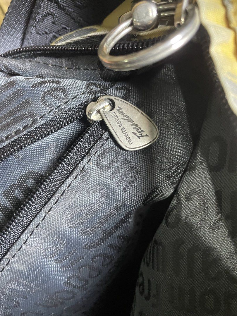 Roberto cavalli bag (Category: Sling Bags) located in Pateros City. Submitted by toogood.mnl (Listing ID 1470522009, Image 3). Description: Roberto cavalli big sling bag Complete tags Authentic No issue Excellent condition .