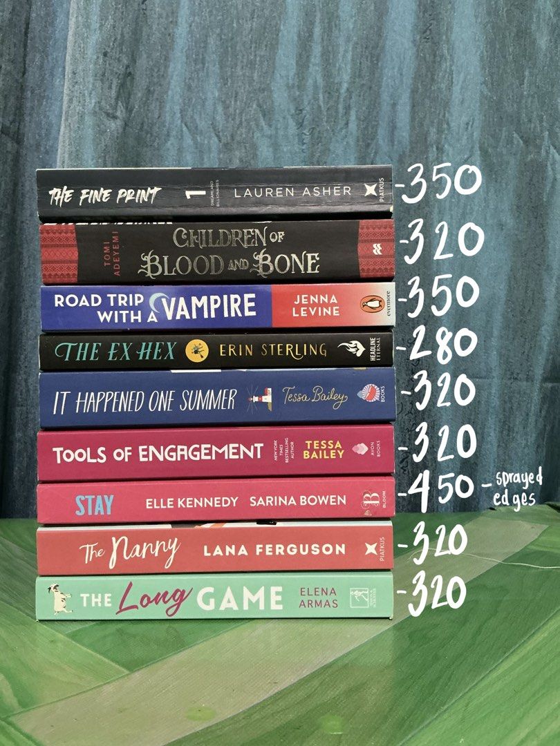 Romance and Fantasy Fiction Paperbacks (Category: Storybooks) located in Cebu City. Submitted by oscarwilding (Listing ID 1470484983, Image 1). Description: Genre: Romance and Fantasy bestsellers Condition: Preloved/Like new (Message for specific title condition) Available Titles: The Fine Print by Lauren Asher - 350 Children of Blood and Bone - 320 Road Trip with a Vampire - 350 The Ex Hex - 280 It Happened One Summer - 320 Tools of Engagement -