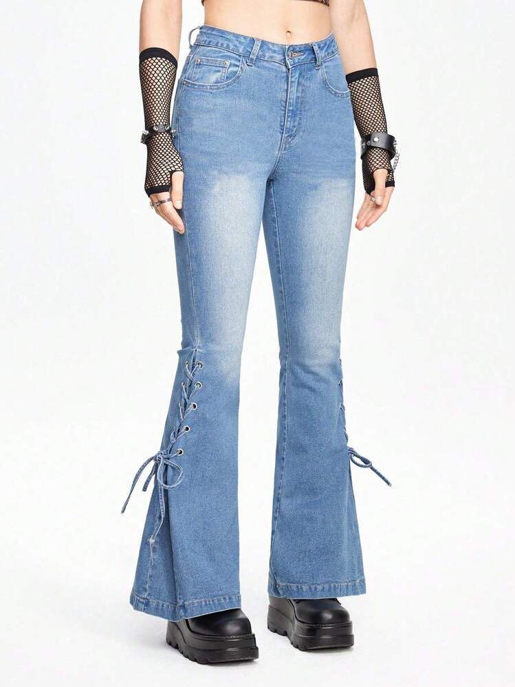 Romwe light-wash flare jeans | Size XS (Category: Jeans) located in General Trias. Submitted by zrchustle.604 (Listing ID 1470495227, Image 1). Description: Romwe light-wash flare jeans featuring adjustable lace-up detailing along the lower outer leg panels. This style blends vintage 2000s Y2K aesthetics with a classic bell-bottom silhouette, making them popular on trendy fashion platforms..
