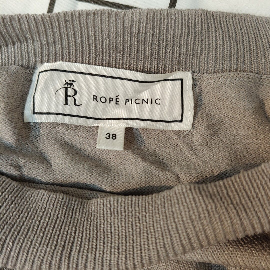 Rope Picnic Grey Knitted Light Sweater M-L (Category: Longsleeves) located in Bulacan. Submitted by alyssarys (Listing ID 1470532096, Image 3). Description: - Brand: Rope Picnic - Size: 38 (fits Medium to Large) - Color: Grey - Material: Lightweight, highly stretchable, and comfortable knit - Design: Solid knit body with stylish sheer pleated long sleeves and ribbed cuffs - Condition: Clean and well-maintained - Style: Versatile for casual days o