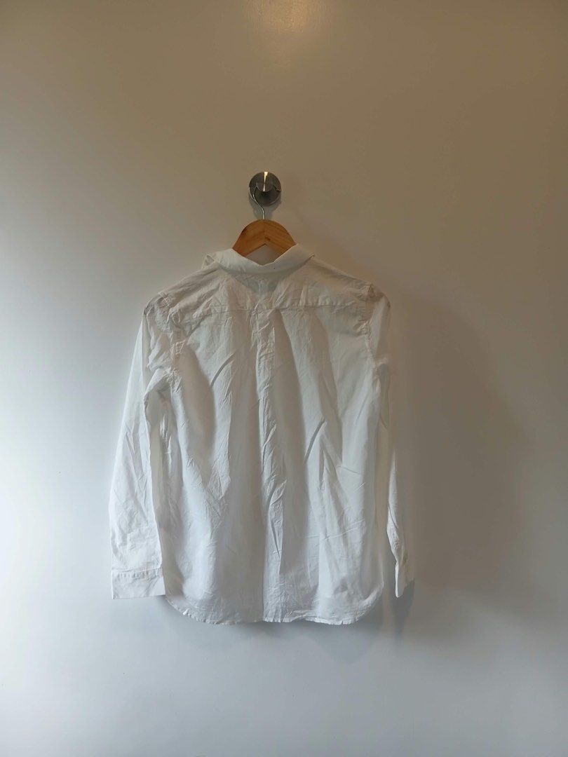 Rope Picnic White Button Down Shirt Size 38 (Category: Shirts) located in Antipolo. Submitted by wisecat.4a7eea (Listing ID 1470399818, Image 3). Description: - Brand: Rope Picnic - Color: Classic White - Size: Tagged 38, fits S to M - Details: Classic collar, front button closure, single chest pocket, long sleeves with button cuffs - Material: Lightweight, easy to style for work or casual outfits - Condition: Minor wrinkling from storage, ready 