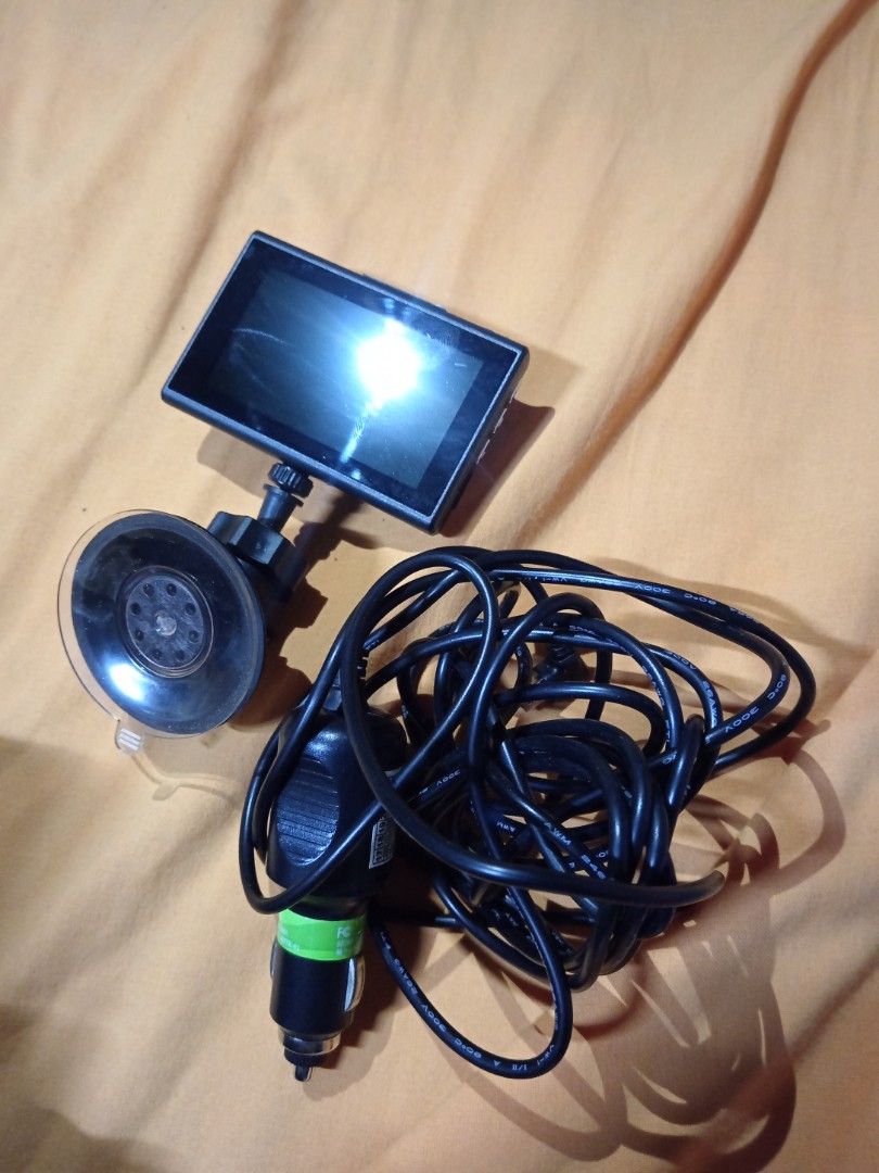 Rover Systems Dash Cam MVR RMA-A1002B (Category: Security Systems & CCTV Cameras) located in Manila. Submitted by mark2669 (Listing ID 1470541502, Image 1). Description: - Brand/Model: Rover Systems MVR RMA-A1002B Dash Camera (Black) - Resolution: Full HD video recording for clear evidence and driving security - Lens: Wide-angle lens to capture more of the road - Inclusions: Suction mount bracket and long car cigarette lighter power cable - Condi