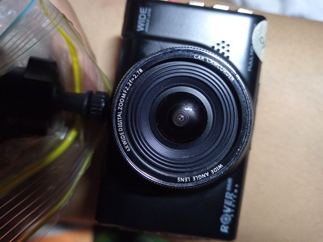 Rover Systems Dash Cam MVR RMA-A1002B (Category: Security Systems & CCTV Cameras) located in Manila. Submitted by mark2669 (Listing ID 1470541502, Image 2). Description: - Brand/Model: Rover Systems MVR RMA-A1002B Dash Camera (Black) - Resolution: Full HD video recording for clear evidence and driving security - Lens: Wide-angle lens to capture more of the road - Inclusions: Suction mount bracket and long car cigarette lighter power cable - Condi