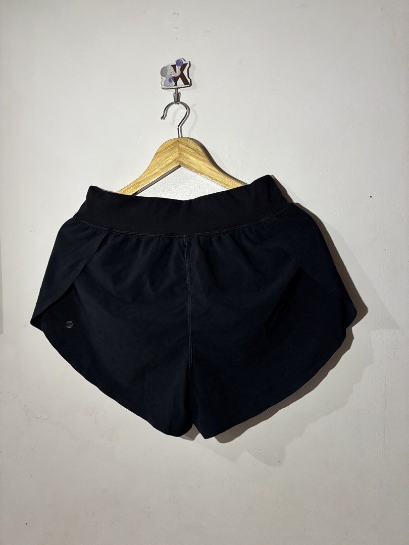 Running split shorts (Category: Shorts) located in Kalibo. Submitted by mack29 (Listing ID 1470351640, Image 1). Description: Size 30 to 32 - Color: Classic Black - Fit: High-rise waistband for extra support and comfort - Mobility: Split leg hem designed for easy movement - Fabric: Lightweight and breathable, ideal for workouts, runs, or daily wear - Detail: Subtle signature Lululemon logo on the left leg.