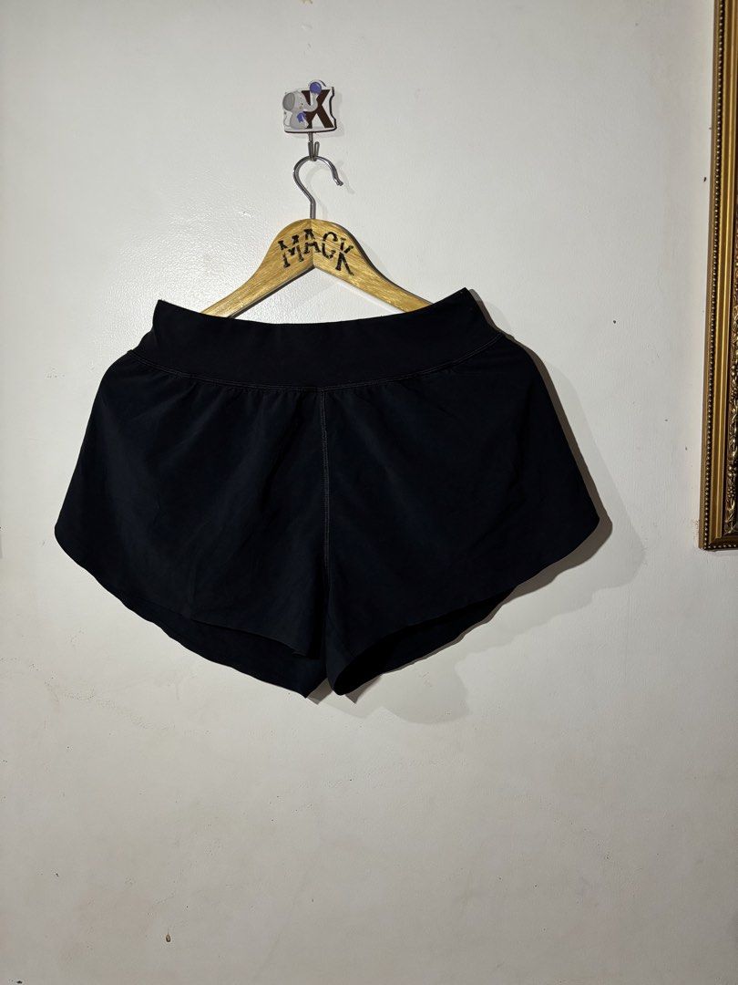 Running split shorts (Category: Shorts) located in Kalibo. Submitted by mack29 (Listing ID 1470351640, Image 2). Description: Size 30 to 32 - Color: Classic Black - Fit: High-rise waistband for extra support and comfort - Mobility: Split leg hem designed for easy movement - Fabric: Lightweight and breathable, ideal for workouts, runs, or daily wear - Detail: Subtle signature Lululemon logo on the left leg.