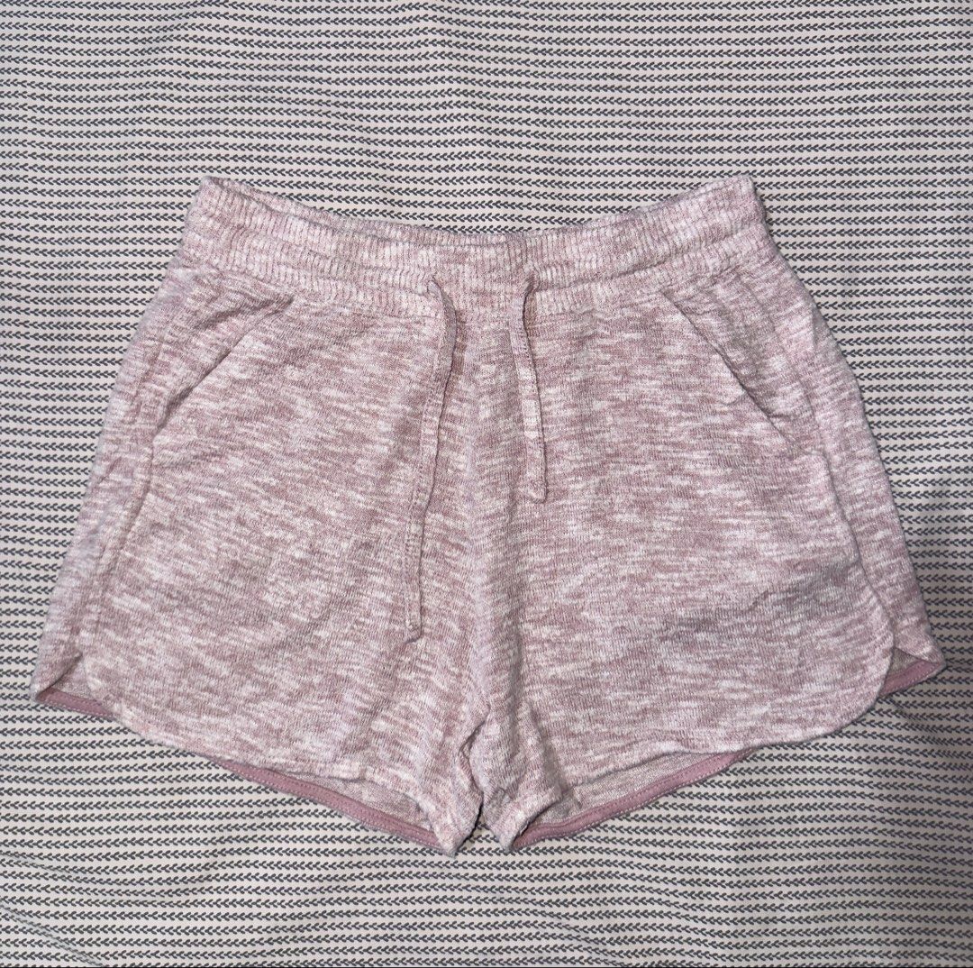 Runway Pink Heathered Drawstring Lounge Shorts Size L (Category: Shorts) located in Santa Ana. Submitted by fatikilla (Listing ID 1470378239, Image 1). Description: - Brand: Runway - Size: Large but kid size - Color: Pink heathered - Material: Soft, comfortable knit - Features: Adjustable drawstring waistband, functional tie, and stylish curved side hems - Condition: Clean fabric overall, great for lounging or casual wear.