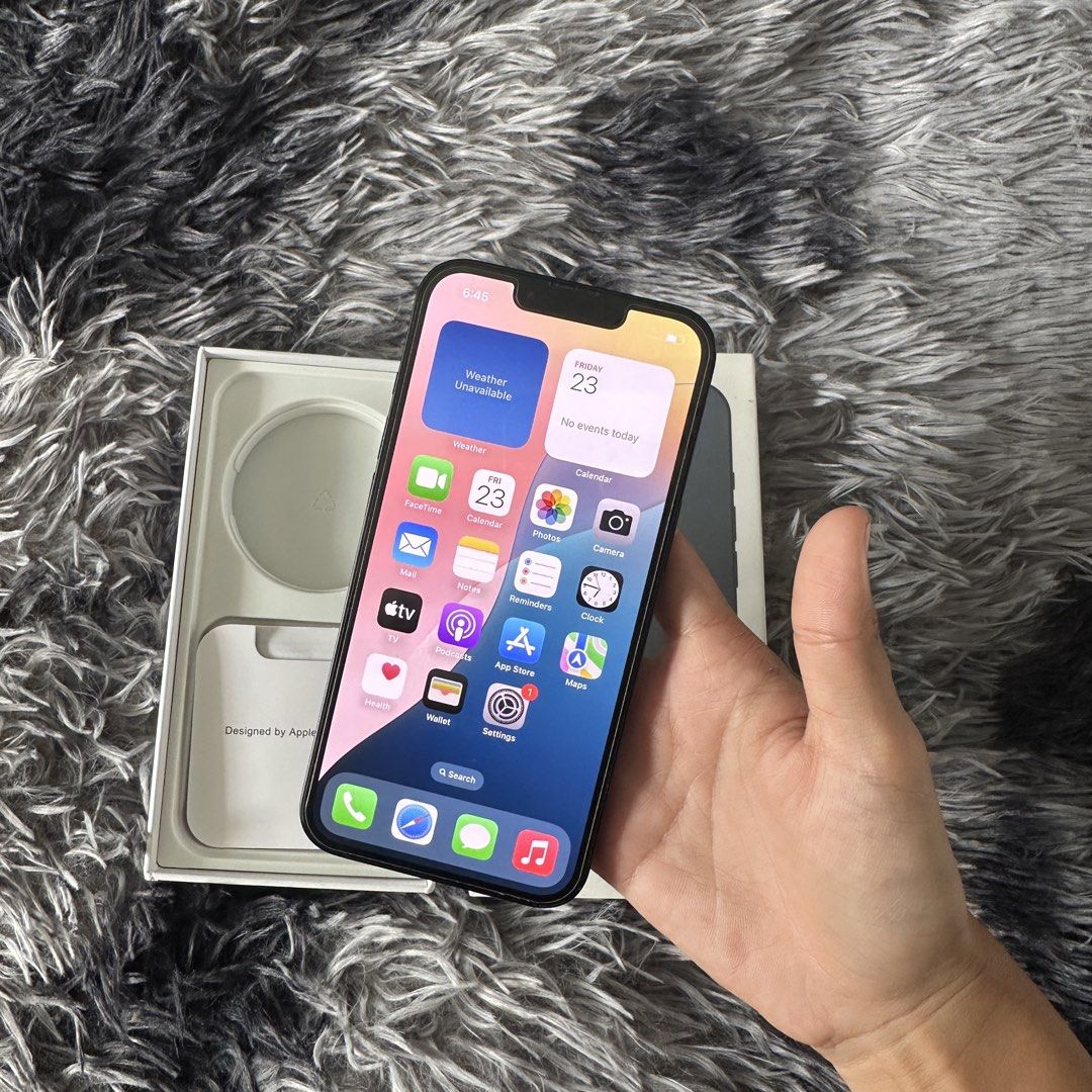 RUSH SALE! IPHONE 13 Midnight — 256GB (Category: iPhone 13 Series) located in Andop. Submitted by y2k.byac (Listing ID 1470361135, Image 2). Description: 📱 RUSH SALE! IPHONE 13 Midnight — 256GB 🖤 ✨ Lady-owned ✨ Pre-owned unit ✨ With box ✨ Factory unlocked — any SIM works ✨ All buttons working ✨ No history of repair CONDITION DISCLOSURE: • Good overall condition with minimal signs of usage. • Has a visible dark/black circular mark or shadow on t