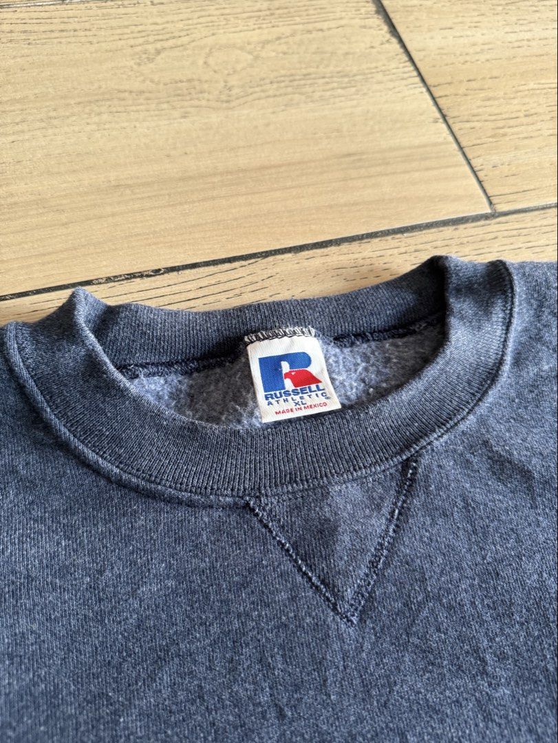 Russell Athletic Heather Blue / Navy Sweater (Category: Coats, Jackets and Outerwear) located in Manila. Submitted by dja23 (Listing ID 1470440462, Image 3). Description: Width: 27 in Length: 27 in Sleeve length: 23 in Color may vary due to lighting, oversized and boxy, no issues, tight ribbings.
