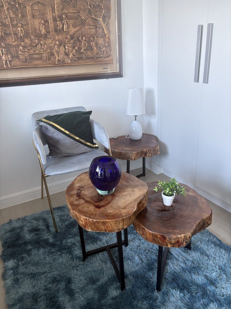 Rustic Live Edge Wood Coffee Table Set Nesting Tables (Category: Tables & Sets) located in Pasig City. Submitted by casambhomedecors (Listing ID 1470393293, Image 1). Description: - Set of 3 nesting coffee tables with unique natural live edge wood slabs - Features stunning natural wood grain patterns on every top - Built with sturdy black metal legs for solid construction and stability - Versatile design: nest them together or place them separate