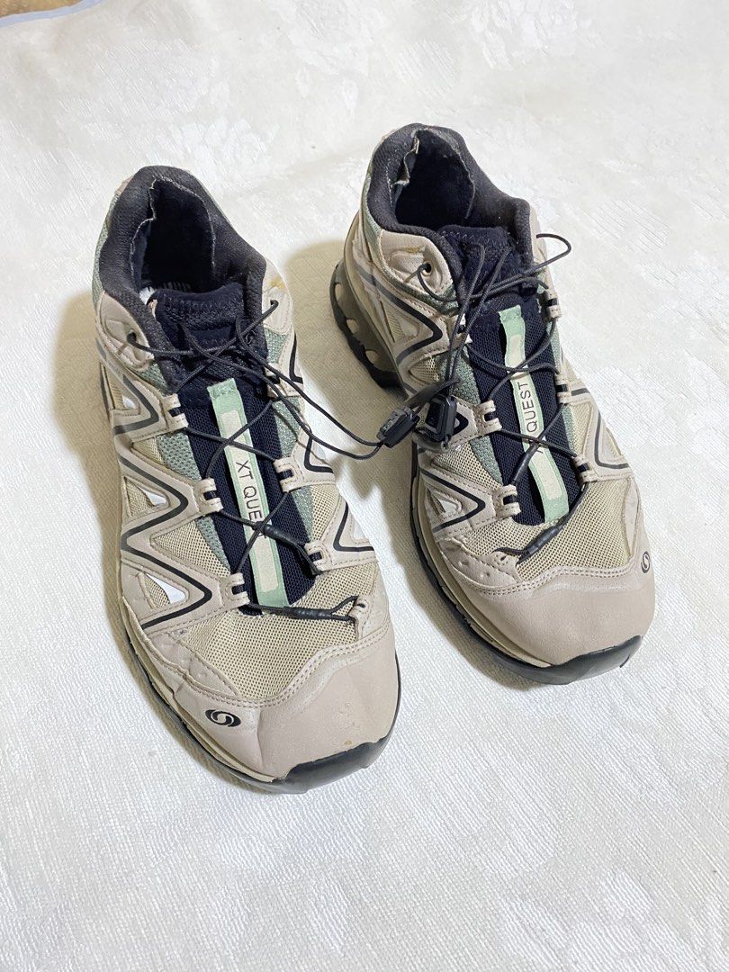 Salomon XT Quest Sneakers Beige Green (Category: Sneakers) located in Barobo. Submitted by sonogonggr22560 (Listing ID 1470510231, Image 3). Description: - Model: Salomon XT Quest trail running shoes - Colorway: Stylish beige and green - Quicklace system for fast and easy wear - Contagrip rubber outsoles for exceptional traction - Sensifit technology for a secure, locked-in fit - Offers great support and grip for outdoor adventures.