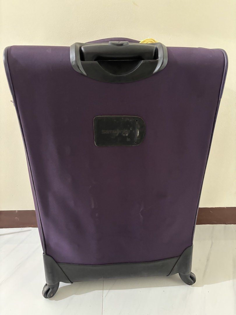 Samsonite Purple Luggage Spinner (Category: Luggage) located in Mandaluyong City. Submitted by user4759642 (Listing ID 1470401166, Image 2). Description: ALSO AVAILABLE IN RED & CHOCO BROWN - Brand: Samsonite - Color: Deep purple - Type: Softside check-in luggage - Mobility: 4 smooth spinner wheels - Handles: Telescoping top handle and convenient side carry handles - Storage: Front zippered compartments for extra organization - Extra: Cute braide