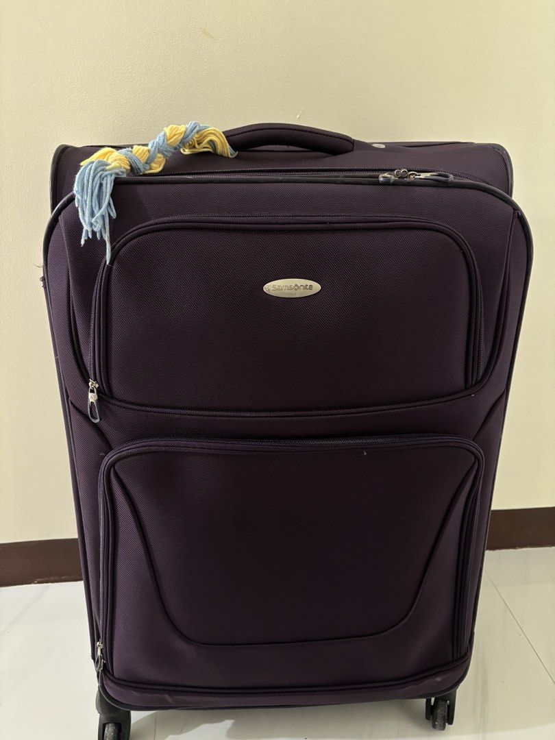 Samsonite Purple Luggage Spinner (Category: Luggage) located in Mandaluyong City. Submitted by user4759642 (Listing ID 1470401166, Image 1). Description: ALSO AVAILABLE IN RED & CHOCO BROWN - Brand: Samsonite - Color: Deep purple - Type: Softside check-in luggage - Mobility: 4 smooth spinner wheels - Handles: Telescoping top handle and convenient side carry handles - Storage: Front zippered compartments for extra organization - Extra: Cute braide
