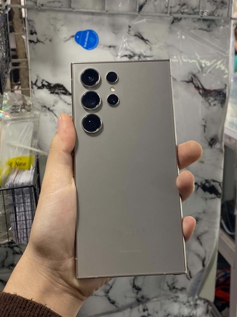 Samsung Galaxy S24 Ultra 256 Titanium Gray (Category: Samsung) located in Pasig City. Submitted by samsungtolentinoph (Listing ID 1470436819, Image 2). Description: For sale only! Samsung Galaxy S24 Ultra 5G (From Smart | NTC Approved) 🏷️ Price list: 256GB - 29,900 🎨 Colors: Titanium Silver (DM for availability) 📦 Package and Condition: Complete with Box • Fully tested • Good as new • No hidden issues • No history of repair • Original S-Pen 🔑