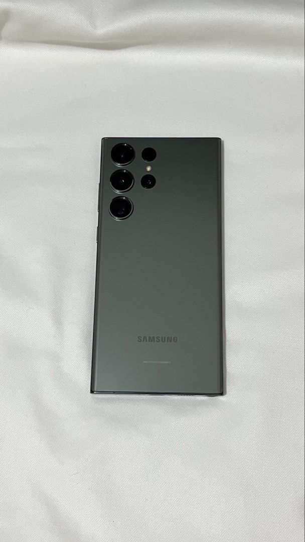 Samsung S23 Ultra 256GB (Category: Samsung) located in Santa Rosa. Submitted by dumbeetle (Listing ID 1470532649, Image 1). Description: Selling 3-Year old Samsung S23 Ultra (Green) Updated price: 19,000 Used mainly for concert videos. Not heavily used. With original box and charger. No history of repair. Honest issues: - Audio from video tends to have a cackling sound when bass is heavy - Adhesive on the back part is starting to detach - Minor s