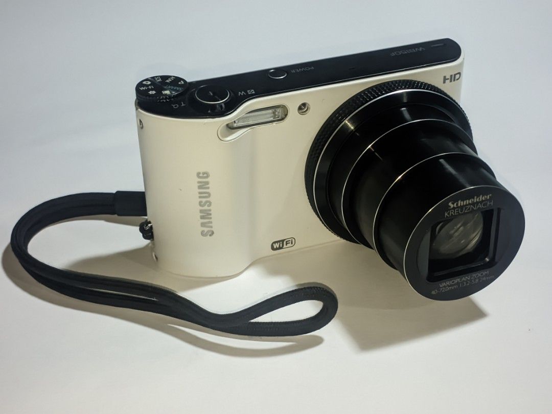 Samsung WB150F - Digicam (Category: Cameras) located in Buenavista. Submitted by itsmarii (Listing ID 1470417112, Image 3). Description: Zoom: 18× optical zoom 34x Hybrid 90x Digital Lens: 24 mm wide-angle Schneider-Kreuznach Resolution: 14.2 MP CCS Wi-Fi Video: 720p HD issues: LCD degradation/LCD Burn inclusions: unit camera bag charging cable no memory card included.