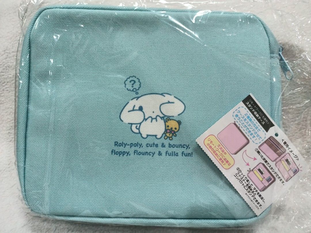 Sanrio Original Cinnamoroll Stand Storage Case Blue Pouch (Category: Purses & Pouches) located in Manila. Submitted by jollynest24 (Listing ID 1470503543, Image 2). Description: - Authentic Sanrio Japan Cinnamoroll stand storage case in light blue - Cleverly converts into a functional desk stand for stationery and small accessories - Features adorable Cinnamoroll graphics printed on both sides - Brand new with original tags still attached - Seale