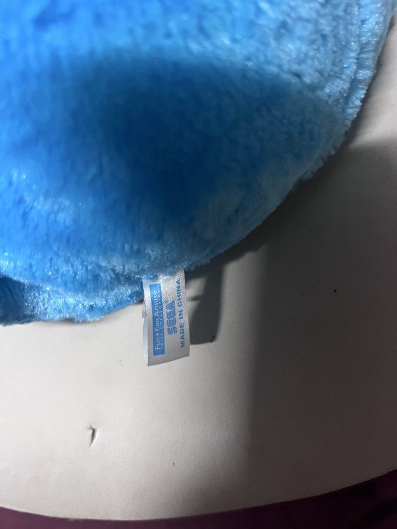 Sega Bunny Plush Toy (Category: Plushies & Soft Toys) located in Bulacan. Submitted by haven_plushie_dolls.888 (Listing ID 1470427826, Image 3). Description: - Official Sega prize collection item straight from Japan - Vibrant bright blue and green furry plush - Features cute embroidered eyes, buck teeth, and a round nose - Designed with adorable big floppy ears - Original tag attached near the bottom back - Perfect addition to any stuffed animal 