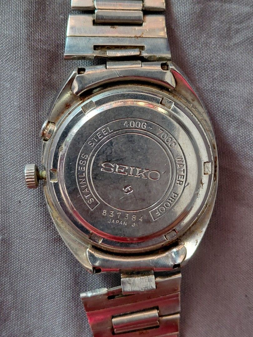 SEIKO BELL-MATIC 27 JEWELS (Category: Luxury Watches) located in Santa Rosa. Submitted by kaijirocruz (Listing ID 1470433329, Image 3). Description: - Vintage 1970s Seiko Bell-Matic mechanical alarm watch (Ref. 4006-7000, Serial: 837384) - Striking silver sunburst dial with a practical day-date window at 3 o'clock - Durable stainless steel case paired with its original matching bracelet - Reliable 27-jewels automatic movement featuring a function