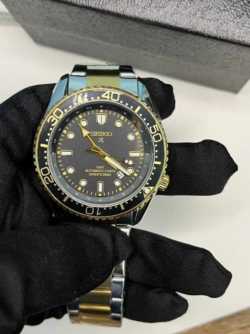 Seiko Prospex GMT Automatic Diver's 200M Two-Tone Watch (Category: Men's Watches) located in Manila. Submitted by seannathan46011 (Listing ID 1470496265, Image 1). Description: Brand new Seiko Prospex Automatic GMT watch. Features a black dial, gold accents, 200M water resistance, and a two-tone bracelet still in protective plastic. Comes with the original Seiko box. Perfect daily driver or luxury gift!.