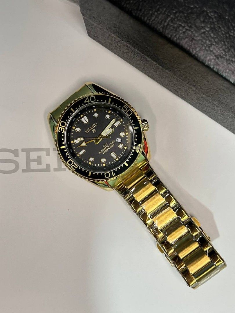 Seiko Prospex GMT Automatic Diver's 200M Two-Tone Watch (Category: Men's Watches) located in Manila. Submitted by seannathan46011 (Listing ID 1470496265, Image 3). Description: Brand new Seiko Prospex Automatic GMT watch. Features a black dial, gold accents, 200M water resistance, and a two-tone bracelet still in protective plastic. Comes with the original Seiko box. Perfect daily driver or luxury gift!.