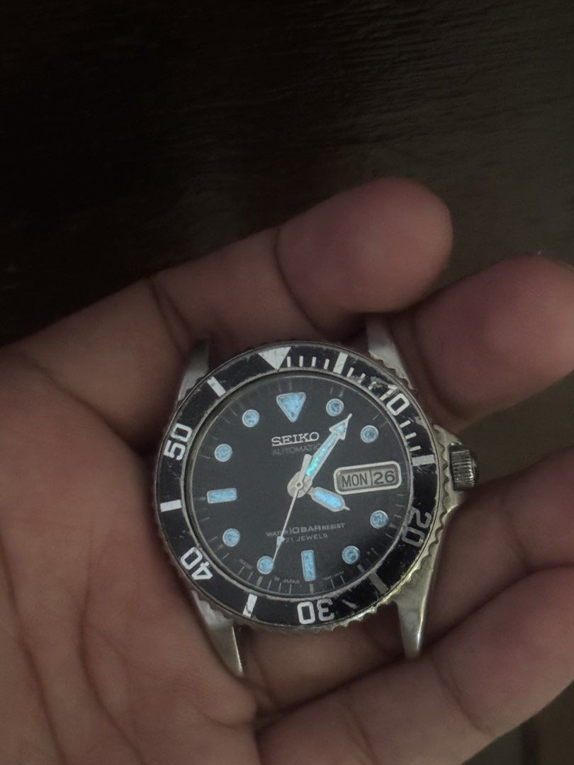 Seiko Submariner 10bar (Category: Men's Watches) located in Manila. Submitted by frierin (Listing ID 1470480066, Image 1). Description: Vintage Seiko automatic watch, 21 jewels movement with day and date window. Black dial, rotating bezel, luminous hands and hour markers. Includes the original Seiko presentation box and a brand new aftermarket jubilee metal bracelet still in its protective plastic packaging. Classic diver aesthetic. Wear on the b
