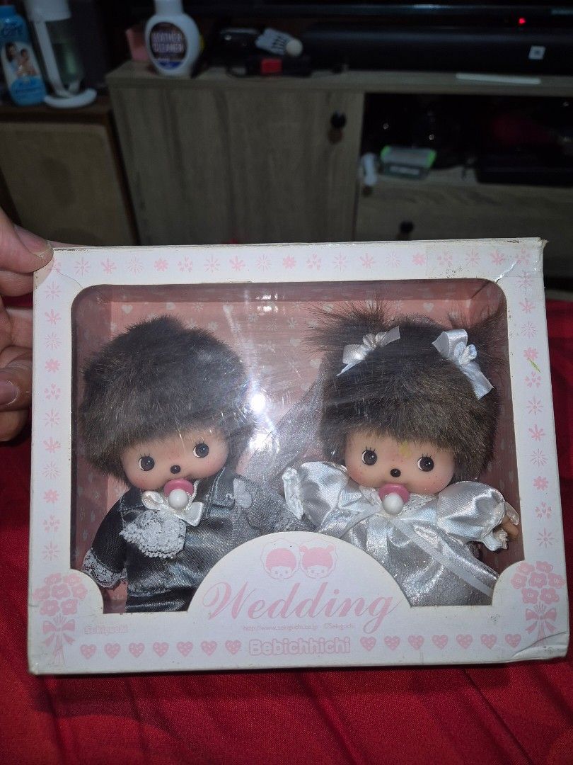 Sekiguchi Bebichhichi Wedding Couple Dolls Set (Category: Figurines & Statues) located in Manila. Submitted by rpaul88 (Listing ID 1470546518, Image 3). Description: - Authentic Sekiguchi Bebichhichi wedding doll set - Includes bride doll in a white dress and groom doll in a grey suit - Features signature brown hair and cute pacifiers in their mouths - Comes with the original pink floral packaging box - Rare and great collectible item for fans an