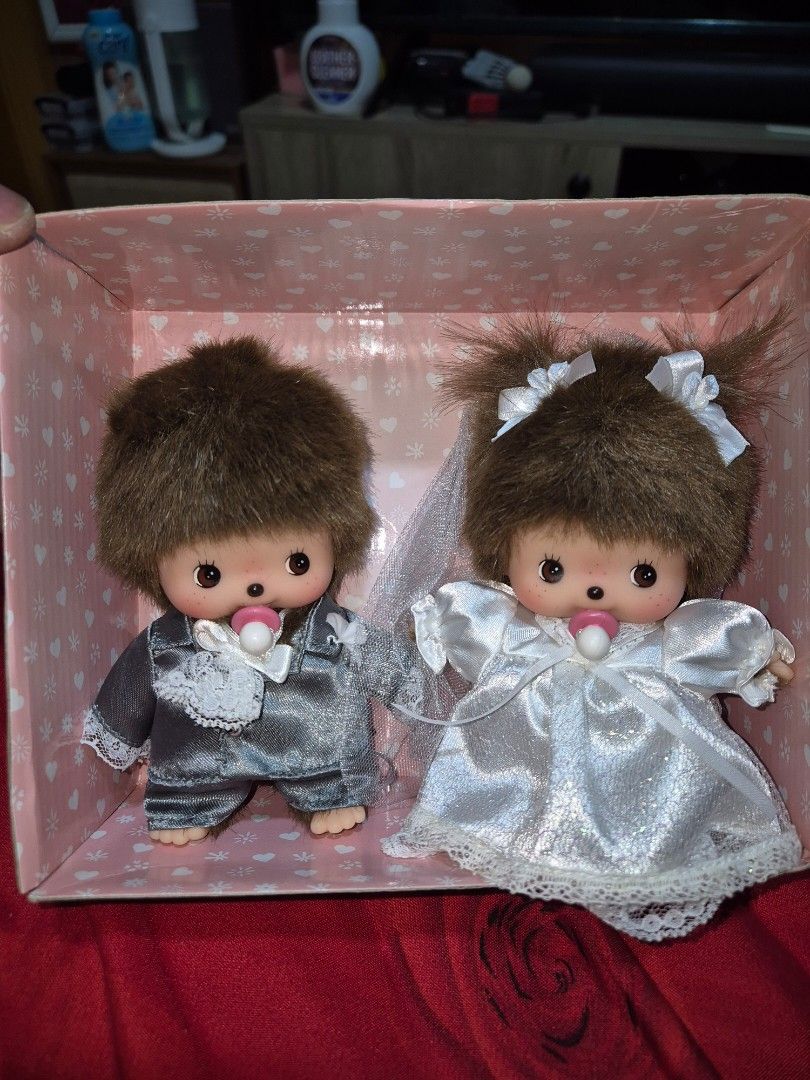 Sekiguchi Bebichhichi Wedding Couple Dolls Set (Category: Figurines & Statues) located in Manila. Submitted by rpaul88 (Listing ID 1470546518, Image 2). Description: - Authentic Sekiguchi Bebichhichi wedding doll set - Includes bride doll in a white dress and groom doll in a grey suit - Features signature brown hair and cute pacifiers in their mouths - Comes with the original pink floral packaging box - Rare and great collectible item for fans an