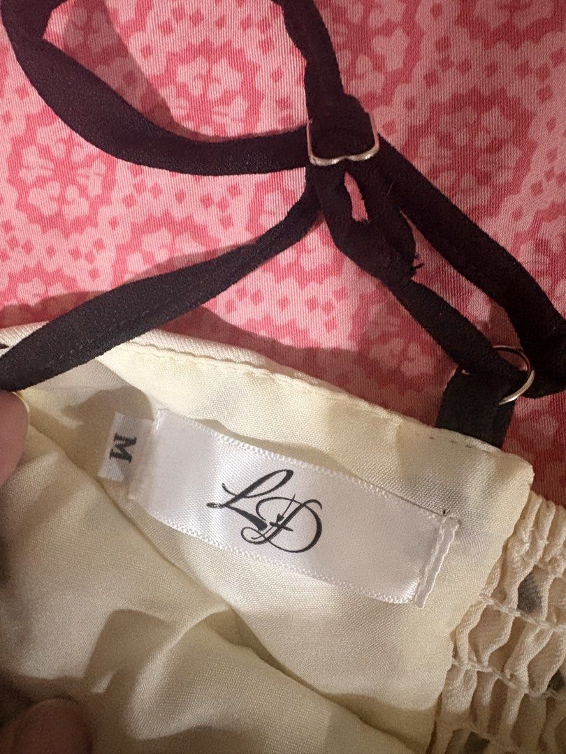 Polka Dot Corset Top (Category: Sleeveless) located in Dasmarinas. Submitted by littleczarmer (Listing ID 1470367221, Image 2). Description: - never worn - bought from kensclothingonline on instagram; bought for 650php - Size: M - dimensions: bust 33-34, waist 27-28, hip 37-38 - Design: Cream and black polka dot with contrast black cups - Features: Adjustable spaghetti straps, ruffled neckline, smocked back panel for comfort, exposed back zipper 