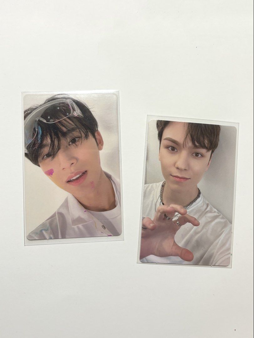 SEVENTEEN Mingyu Vernon official photocards (Category: K-Wave Merchandise) located in Manila. Submitted by rachelmsabila22 (Listing ID 1470515622, Image 1). Description: - Official SEVENTEEN photocards: Mingyu (paint smudges & safety goggles) and Vernon (with rings) - Condition: Kept in protective sleeves, clean edges, no major creases or scratches - Perfect addition to any Carat collection - DM for more pictures or inquiries - Modest offers cons
