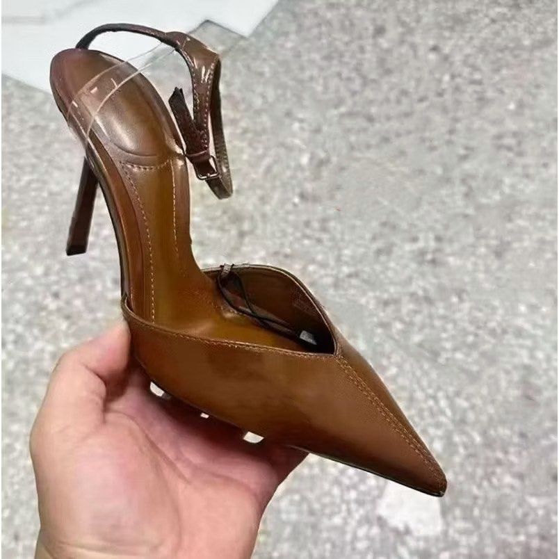 Shallow Brown Patent Leather Effect High Heels Size 36 (Category: Heels) located in Antipolo. Submitted by cara4514 (Listing ID 1470465976, Image 1). Description: - Style: Shallow brown patent leather effect high heels - Size: EU 36 - Heel Height: 7 cm stiletto - Design: Pointed toe with trendy clear side panels - Closure: Ankle strap with buckle - Condition: used once, like new - Reason for selling: used only for the wedding.