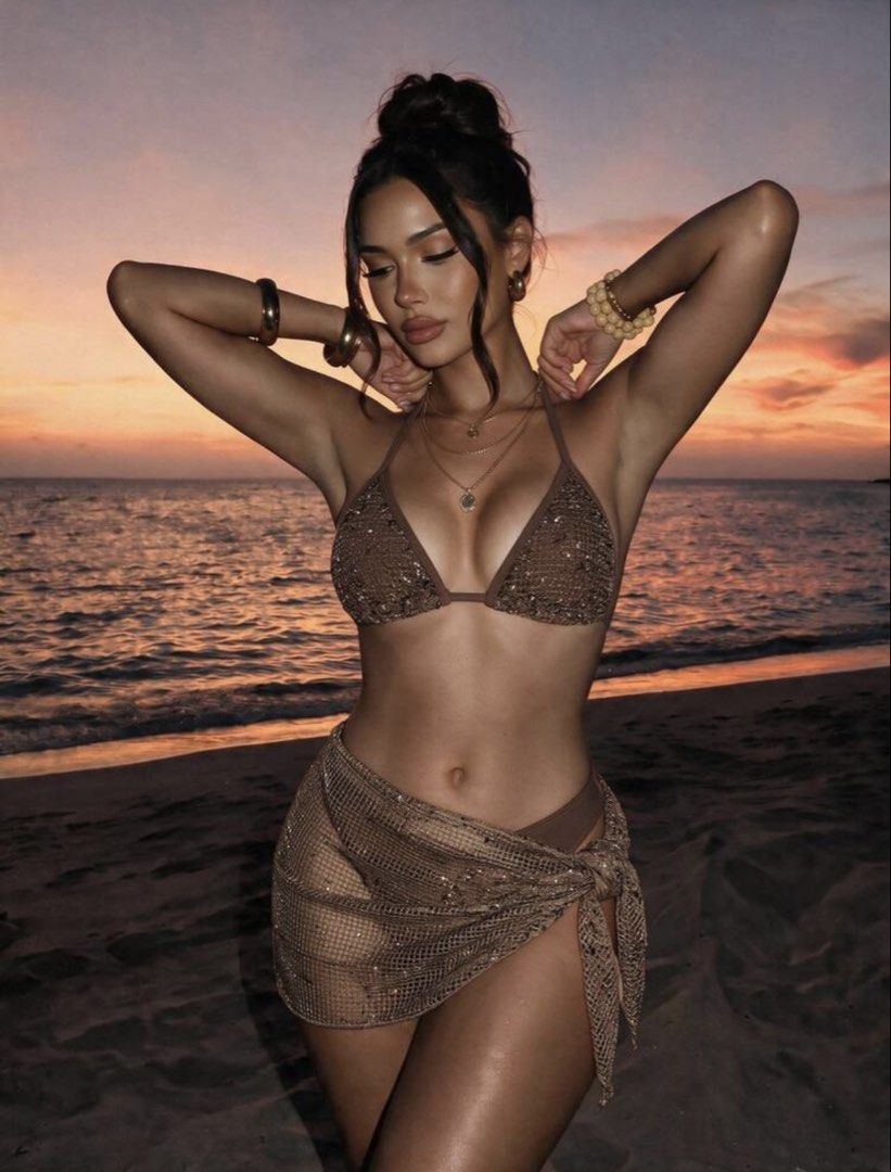 Shein Brown Bikini Set (Category: Bikinis & Swimsuits) located in Cainta. Submitted by lovecalluengg (Listing ID 1470503256, Image 1). Description: - 3-piece brown swimwear set for beach or pool days - Triangle halter bikini top accented with subtle sparkles - Matching side-tie bikini bottoms in solid brown - Sheer mesh sarong wrap with sparkly metallic threading and waist tie - Crafted from soft and comfortable stretch material.