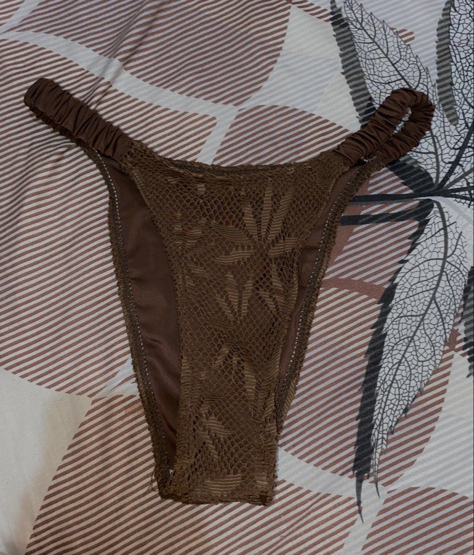 SHEIN Brown Crochet Shell Beaded Triangle Bikini Set Small (Category: Bikinis & Swimsuits) located in Manila. Submitted by katangiii (Listing ID 1470516976, Image 3). Description: - Brand: SHEIN - Item: Brown bikini set (triangle top and matching bottoms) - Size: Small - Accents: White marbled beads and gold spacers on straps and center front - Condition: Brand new with tags, in original ziplock packaging.