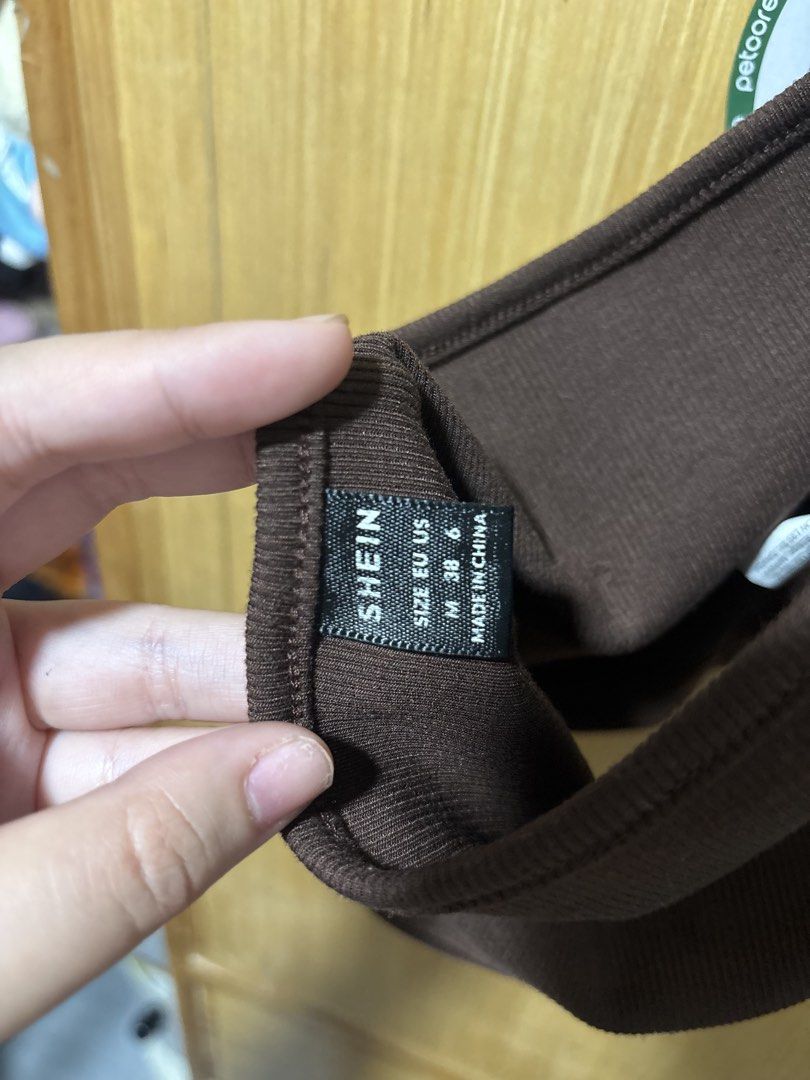 SHEIN Brown Ribbed Halter Top Size M (Category: Sleeveless) located in Taguig. Submitted by pauu1234 (Listing ID 1470404633, Image 2). Description: 📌 Only used once 📌 Fits M-L body frames Original price: ₱180 - payment first basis - next day pick up (contact seller if needed immediately) - taguig area 😊.