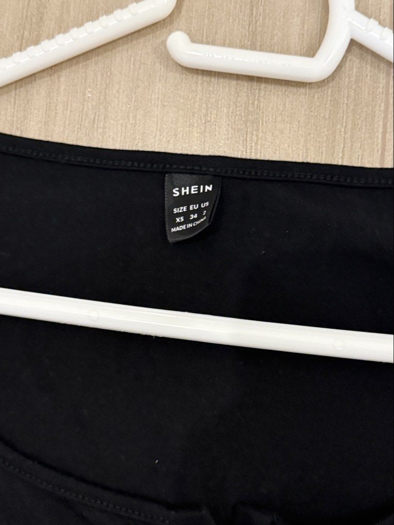 SHEIN button fit black longsleeve (Category: Longsleeves) located in Manila. Submitted by bella_boo (Listing ID 1470473421, Image 2). Description: have to sell by TUESDAY tags 🏷️ brandy melville subdued edikted cotton on stradivarius pull and bear hnm zara bershka.
