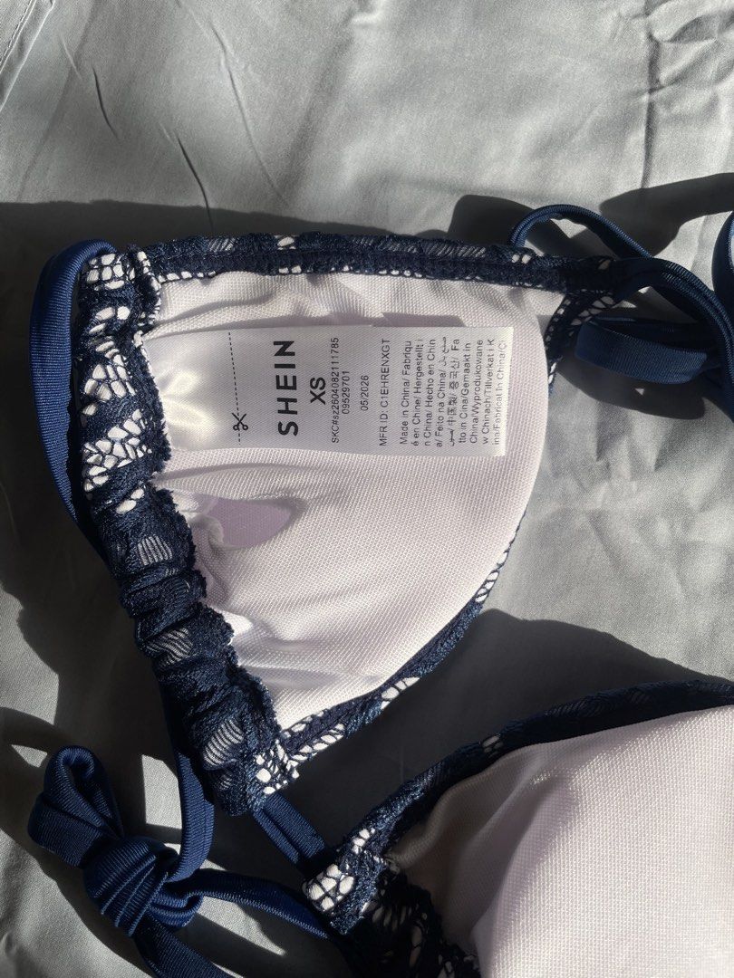 Shein Navy Blue Lace Halter Bikini Top (Category: Bikinis & Swimsuits) located in Naga. Submitted by threads_and_treats92 (Listing ID 1470417979, Image 3). Description: Unused, Brand new with pouch Top only RFS: Wrong size.