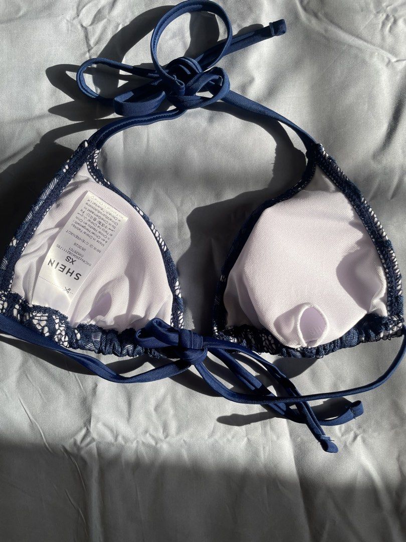 Shein Navy Blue Lace Halter Bikini Top (Category: Bikinis & Swimsuits) located in Naga. Submitted by threads_and_treats92 (Listing ID 1470417979, Image 2). Description: Unused, Brand new with pouch Top only RFS: Wrong size.