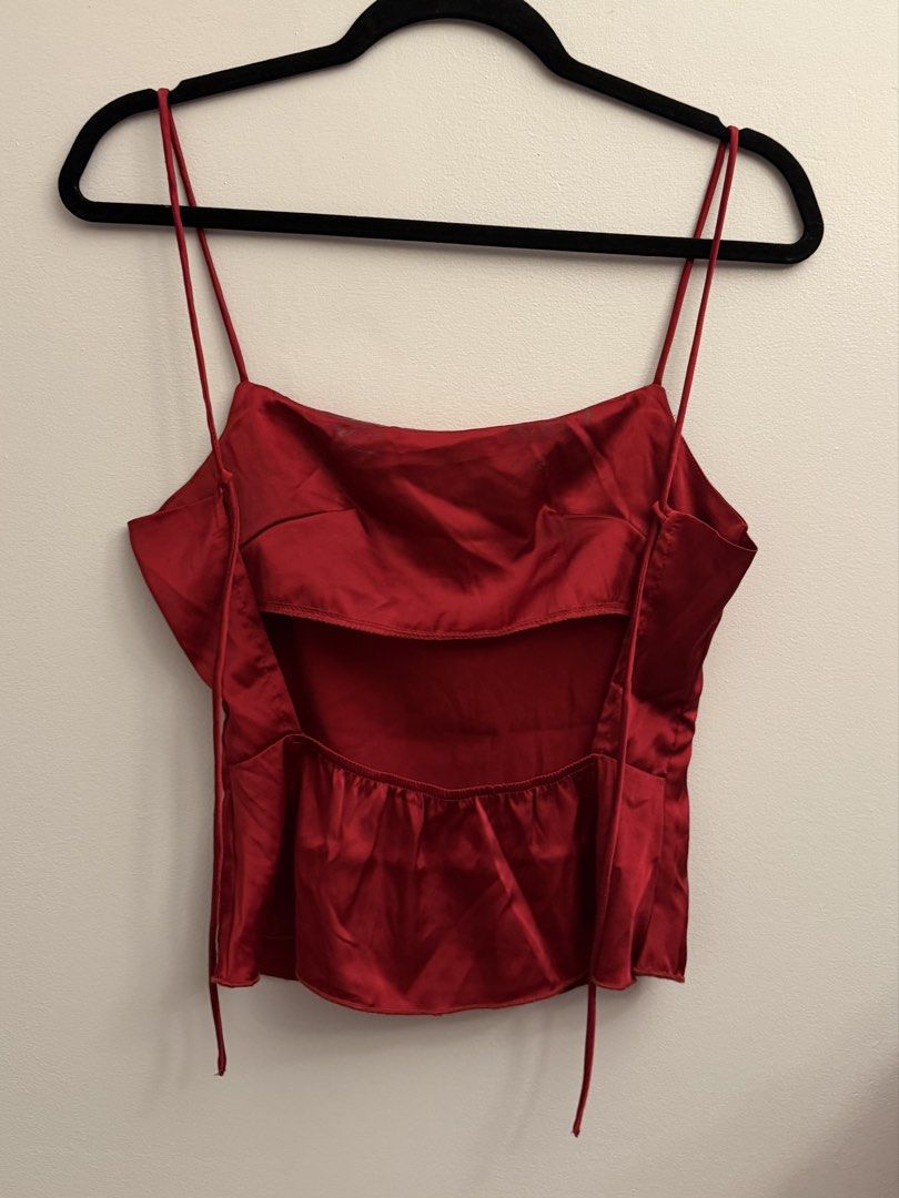 SHEIN Red Back self tie Top small (Category: Sleeveless) located in Manila. Submitted by closetclearout.mnl (Listing ID 1470395955, Image 2). Description: xs - s don’t wear it anymore defect: stain inside the top (eyelash glue) .