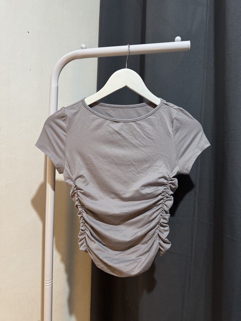 shein side ruched gray top (Category: Others Tops) located in Marilao. Submitted by camillaaa_ (Listing ID 1470401238, Image 1). Description: shein ruched gray top s-m used once only.